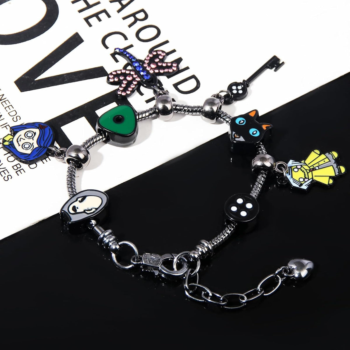 Dark Fantasy Button-Eye Charm Bracelet – Adjustable Storybook-Inspired Bracelet with Cat, Key & Dragonfly Charms